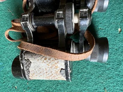 Pair of binoculars, 8 x 25. With brown leather...