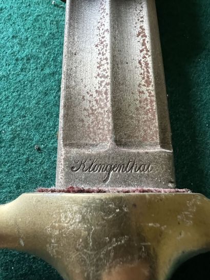 Dagger of venery. Ebony handle. Brass mounting....