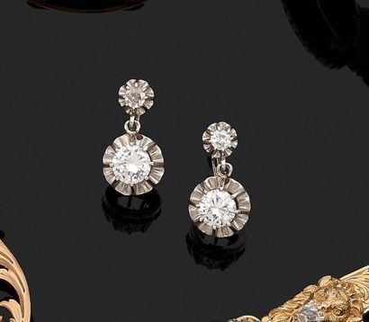 Pair of platinum 850‰, 18K 750‰ and 14K (585‰)...