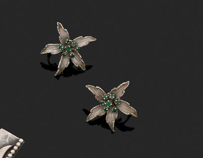 Pair of ear clips in the shape of flowers...