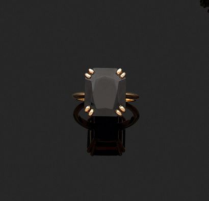 Ring decorated with a rectangular sapphire...