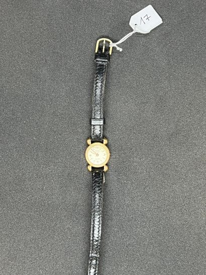 HERCEY

Lady's wristwatch, the round case...