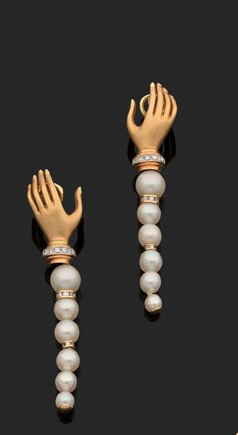 Pair of earrings featuring an 18K yellow...