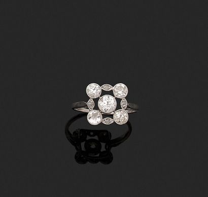 Ring set with a main brilliant in a square...