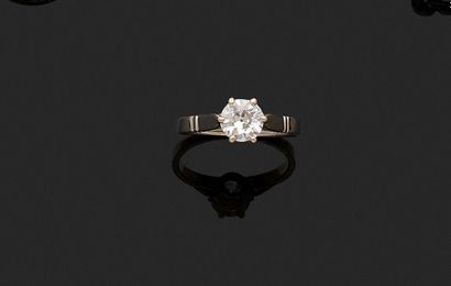 Ring decorated with a brilliant mounted in...