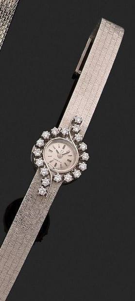 OMEGA

Ladies' wristwatch, round case, diamond...