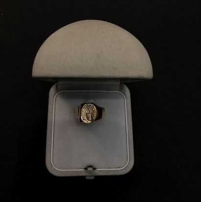 Gold lot including a cross, five rings and...
