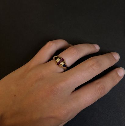 Gold lot including a cross, five rings and...
