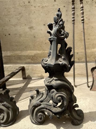 Pair of andirons and fire instruments, Louis...