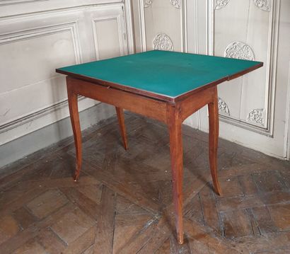 Louis XV period game table in fruit wood.

It...