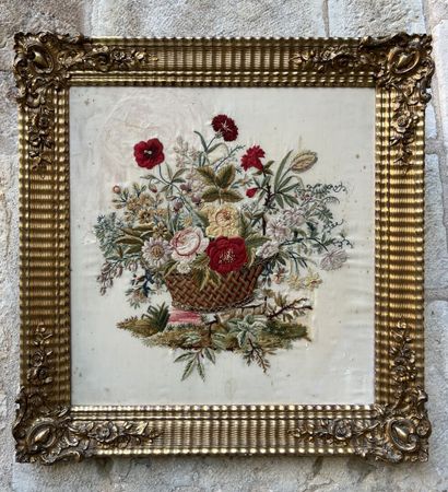 Embroidery on silk in a carved and gilded...