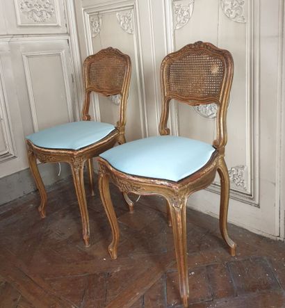 Pair of chairs in carved and gilded wood...
