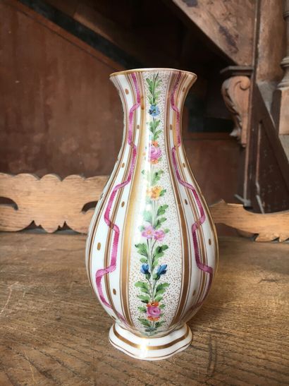 In the taste of Sevres

Porcelain vase, with...