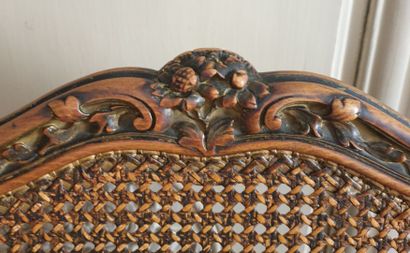 Pair of chairs in carved and gilded wood...