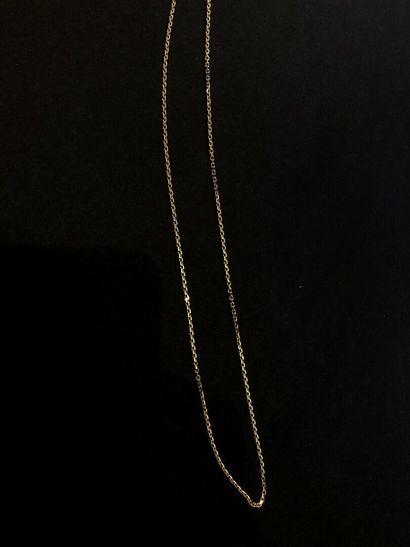 Gold lot including a cross, five rings and...