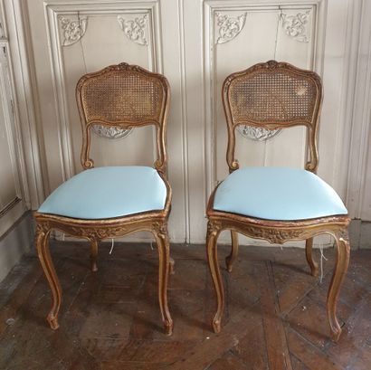 Pair of chairs in carved and gilded wood...