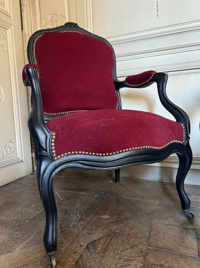 Pair of blackened wood armchairs, molded...