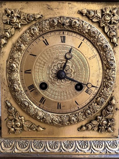 Clock in chased and gilded bronze of the...