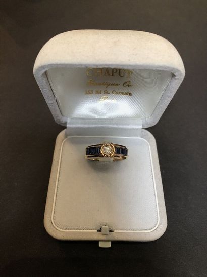 Gold lot including a cross, five rings and...