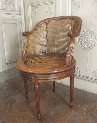 Louis XVI style natural wood desk armchair.

It...