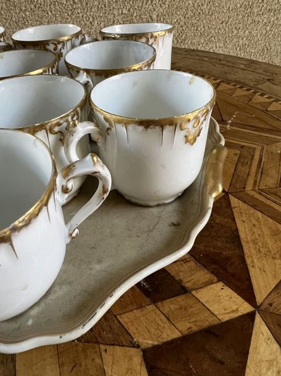 Eight white porcelain cups and saucers, 19th...