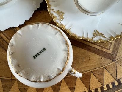 Eight white porcelain cups and saucers, 19th...