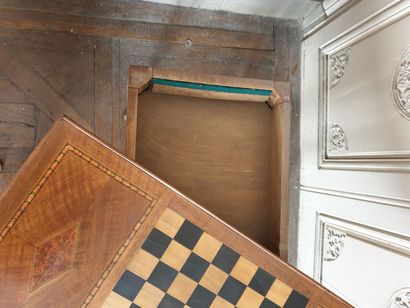 Louis XV period game table in fruit wood.

It...