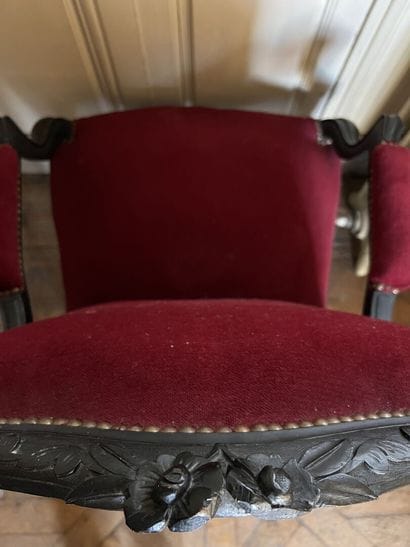 Pair of blackened wood armchairs, molded...