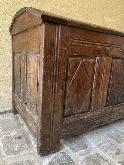A molded and carved wooden chest, early 17th...