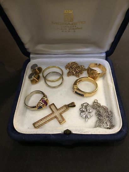 Gold lot including a cross, five rings and...