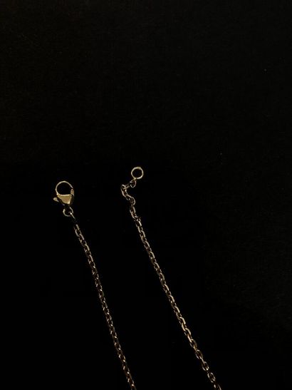 Gold lot including a cross, five rings and...