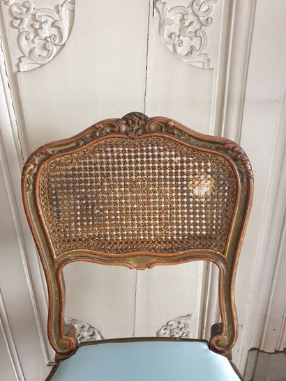 Pair of chairs in carved and gilded wood...