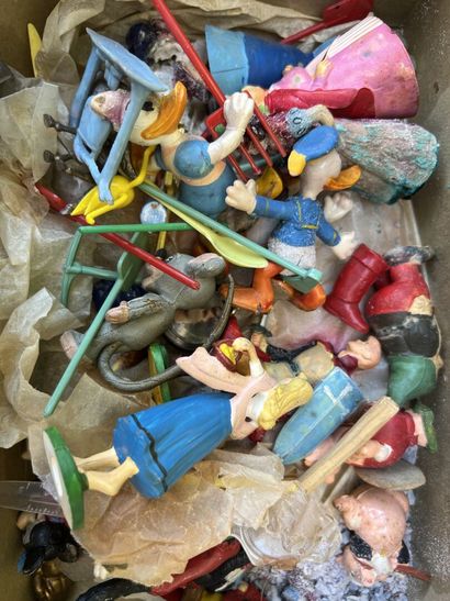 Large lot of dolls, comic book figures, wind-up...