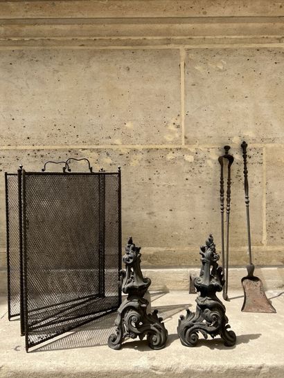 Pair of andirons and fire instruments, Louis...