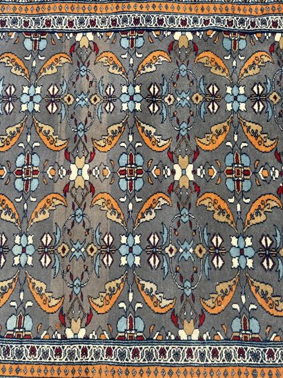 Two woolen carpets 

With geometrical decoration...
