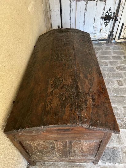 A molded and carved wooden chest, early 17th...