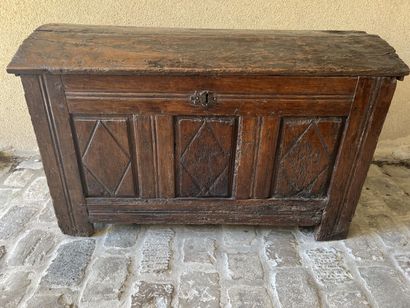 A molded and carved wooden chest, early 17th...