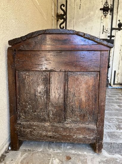 A molded and carved wooden chest, early 17th...
