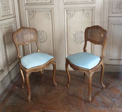 Pair of chairs in carved and gilded wood...