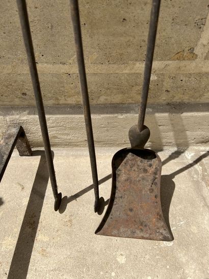 Pair of andirons and fire instruments, Louis...