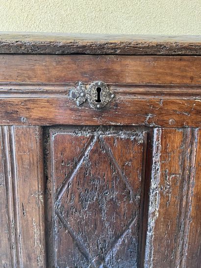 A molded and carved wooden chest, early 17th...