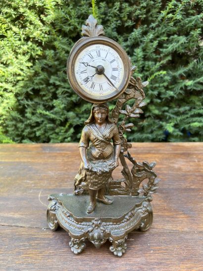 Clock in regula. 

H. 35 cm