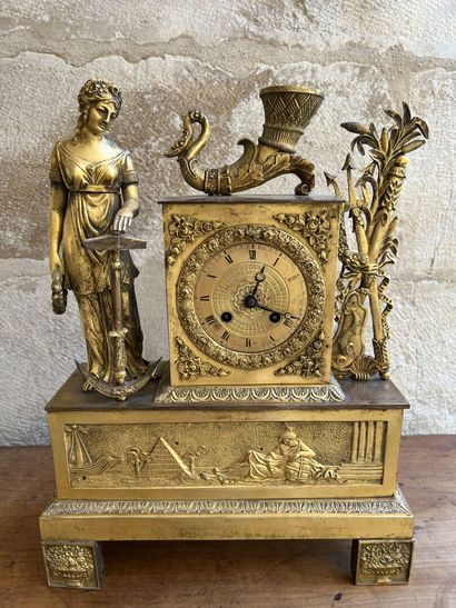 Clock in chased and gilded bronze of the...