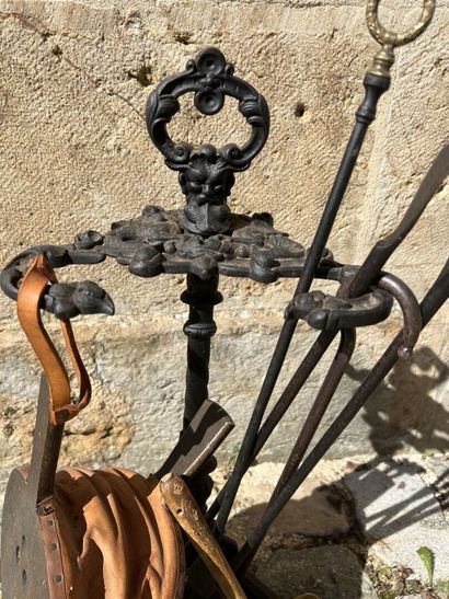 Fire server in cast iron and bronze decorated...