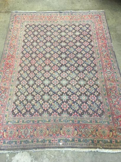 Carpet on blue background with pink border

192...