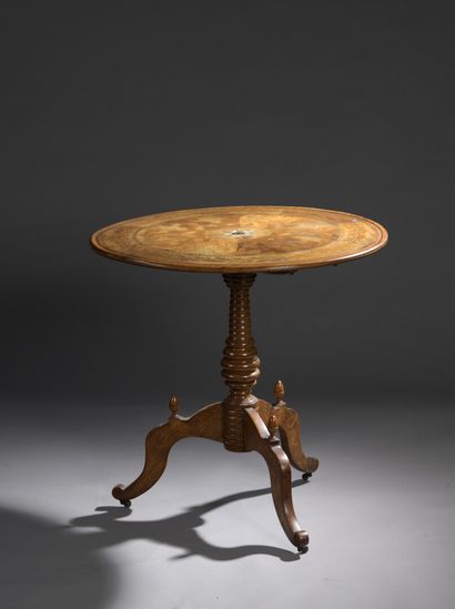 Pedestal table in light wood veneer and mother...