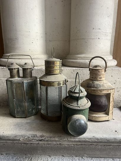 Set of four lanterns, one marked PORT XIX...