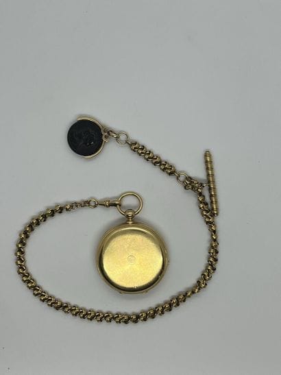 Guilloché gold pocket watch with a black...