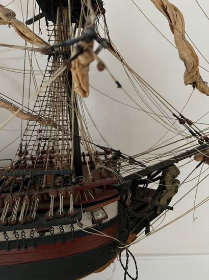Small model of a three-masted boat 

Acc...