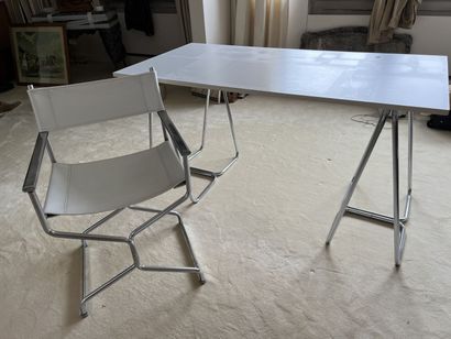 Suite of four tubular armchairs in steel...